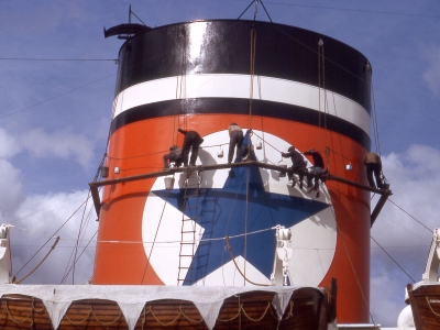 Crew painting the funnel of British cargo liner Gladstone Star in Hobart, April 1966 (Rex Cox)